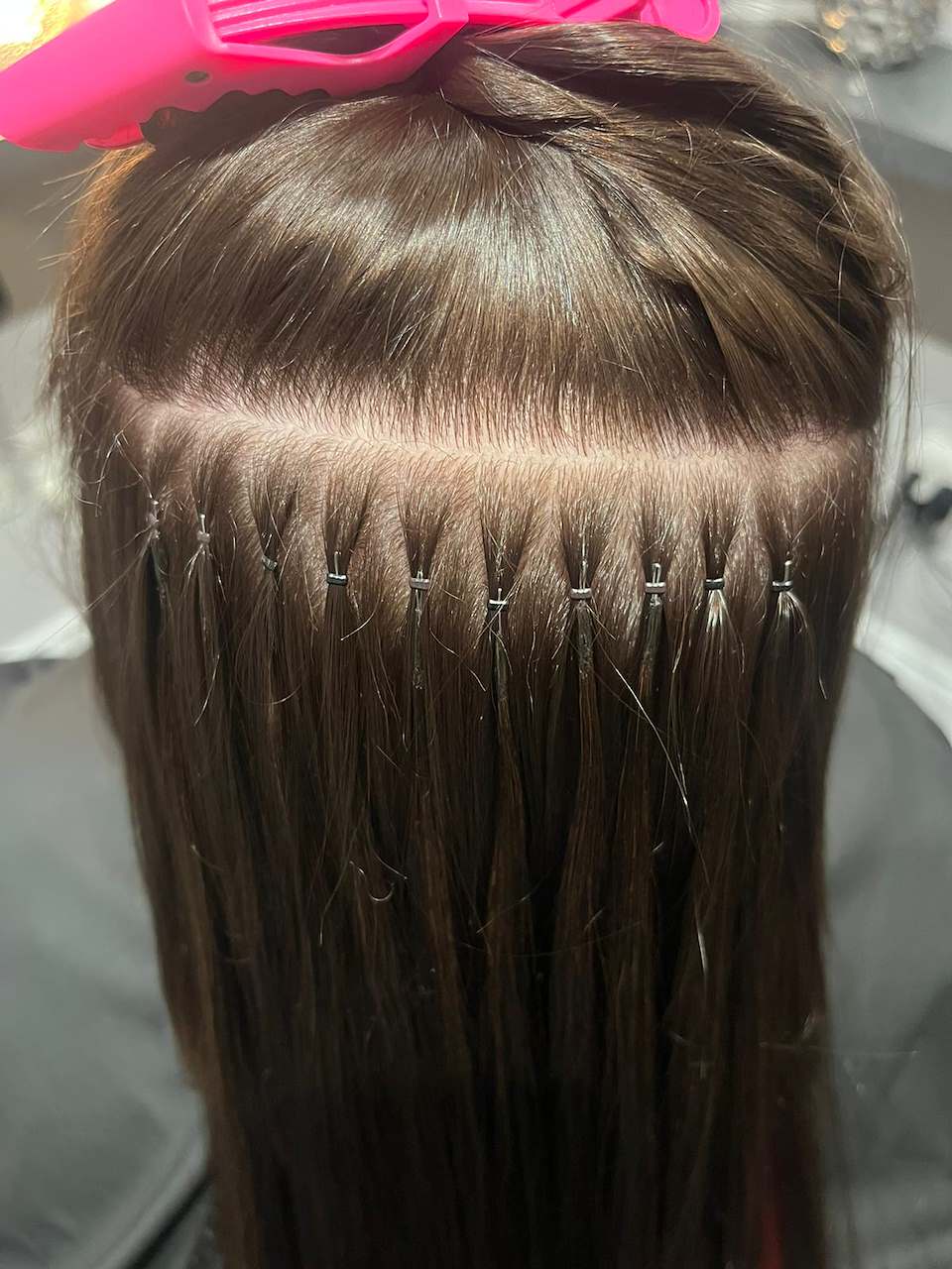 visual of nano link hair extensions in clients hair