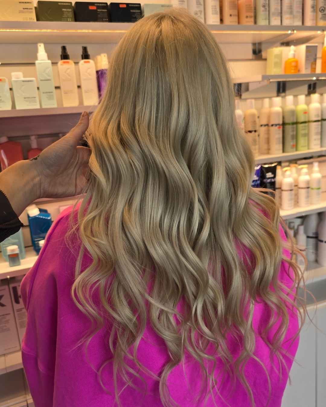 showcasing clients blonde hair extensions